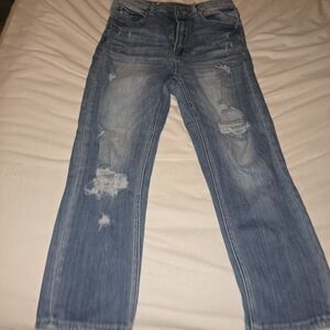Distressed Risen Capri Blue Jeans
